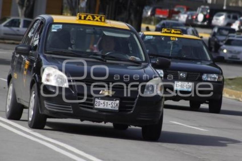 TRANSPORTE . TAXI