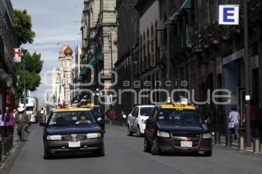 TRANSPORTE . TAXI