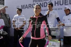 CARRERA MARCANDO HUELLAS