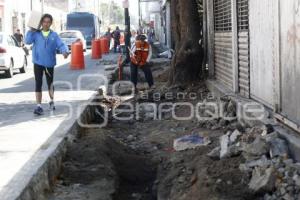 COLOCACIÓN LOSAS AVENIDA JUAN DE PALAFOX