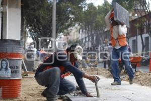 COLOCACIÓN LOSAS AVENIDA JUAN DE PALAFOX