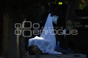 HOMBRE ASESINADO . HUEXOTITLA