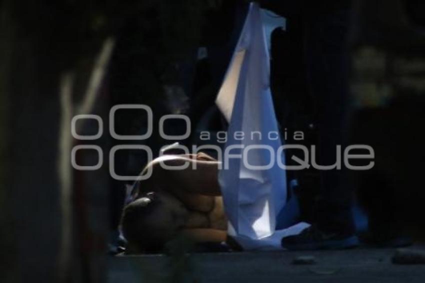 HOMBRE ASESINADO . HUEXOTITLA