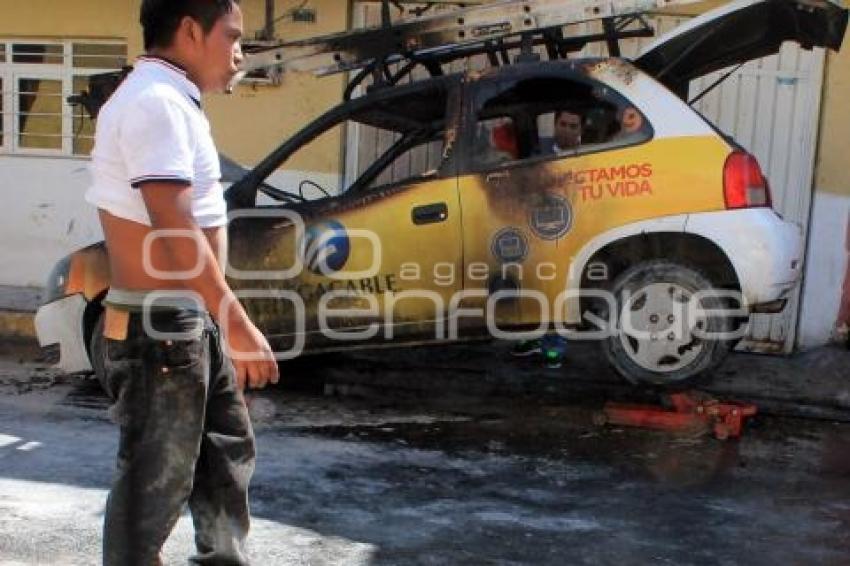 AUTO INCENDIADO . TEHUACÁN