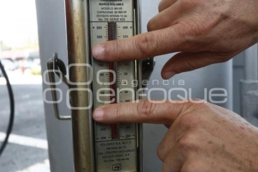 GASOLINA . MEDICIÓN DE BOMBAS