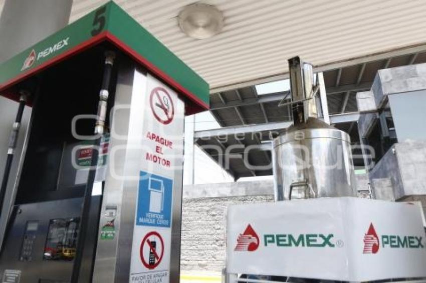 GASOLINA . MEDICIÓN DE BOMBAS