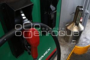 GASOLINA . MEDICIÓN DE BOMBAS