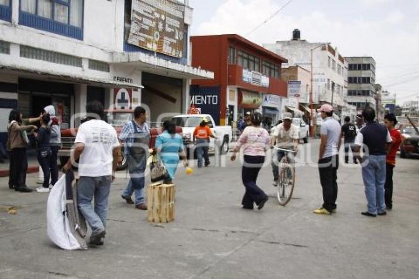 ENFRENTAMIENTO COMERCIANTES . TEXMELUCAN