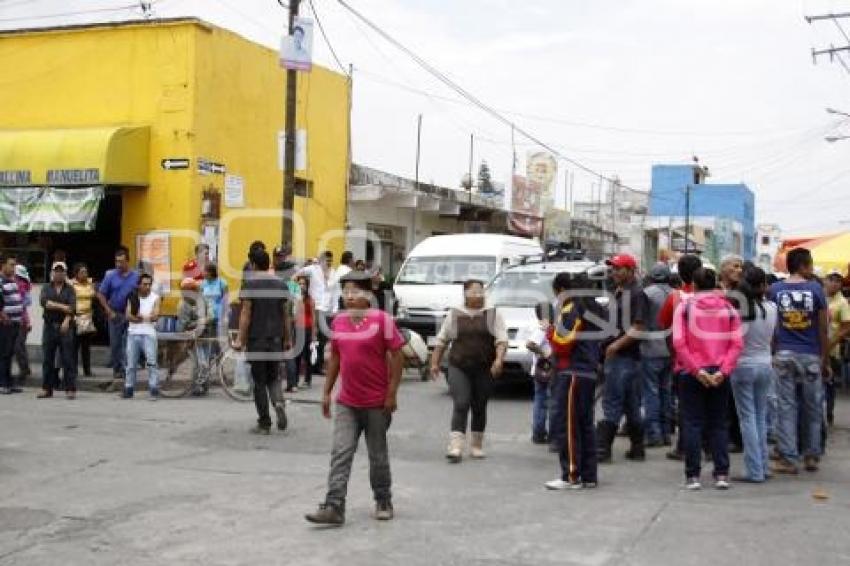 ENFRENTAMIENTO COMERCIANTES . TEXMELUCAN