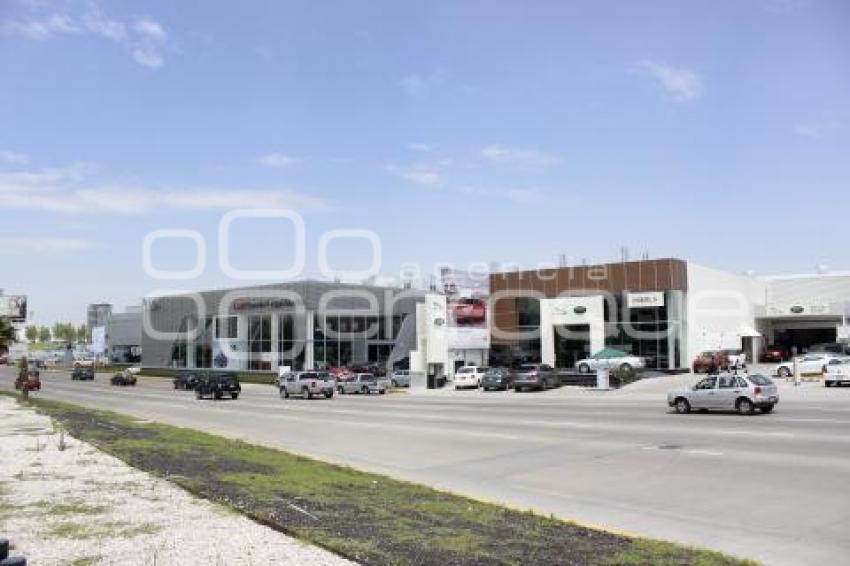 AGENCIAS DE AUTOS Y CENTROS COMERCIALES