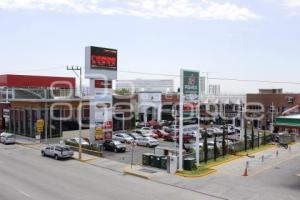 AGENCIAS DE AUTOS Y CENTROS COMERCIALES