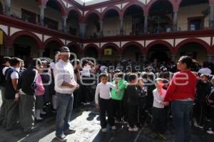 SIMULACRO DE SISMO . ESCUELAS