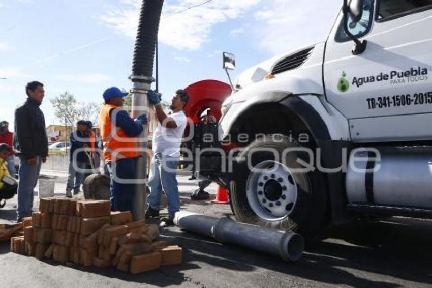 AGUA DE PUEBLA . SUSPENSIÓN PERIPLAZA