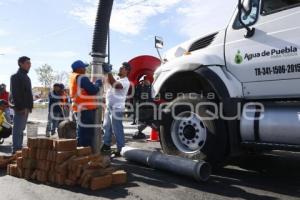 AGUA DE PUEBLA . SUSPENSIÓN PERIPLAZA