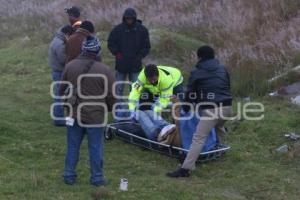 HALLAN CUERPO EN AUTOPISTA