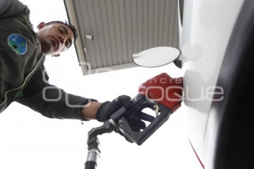 GASOLINA . REDUCCIÓN DE PRECIO