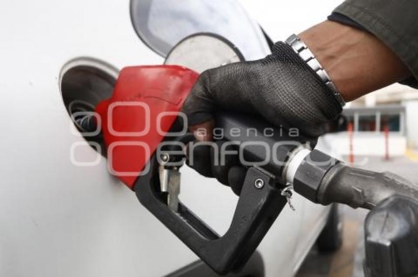GASOLINA . REDUCCIÓN DE PRECIO
