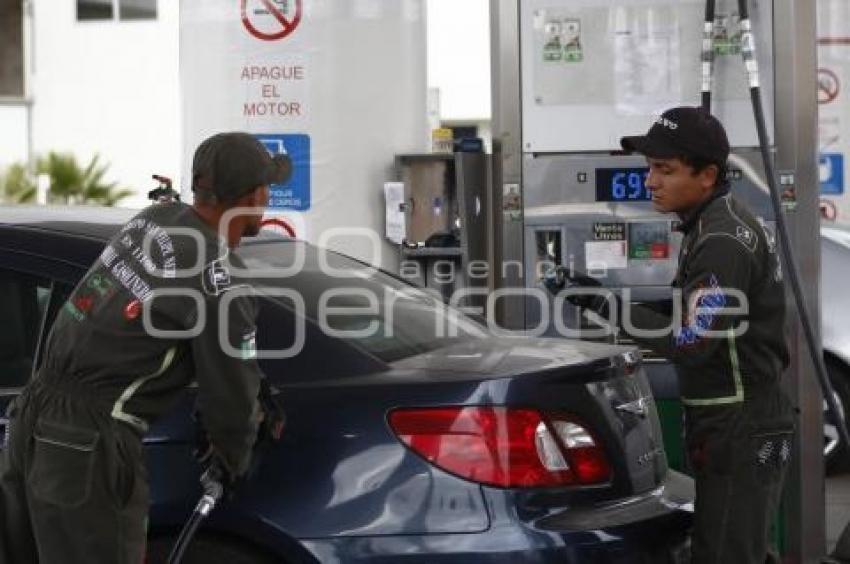 GASOLINA . REDUCCIÓN DE PRECIO