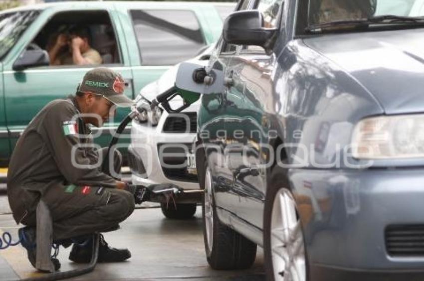 GASOLINA . REDUCCIÓN DE PRECIO