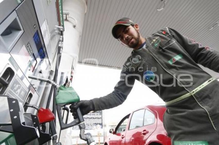 GASOLINA . REDUCCIÓN DE PRECIO