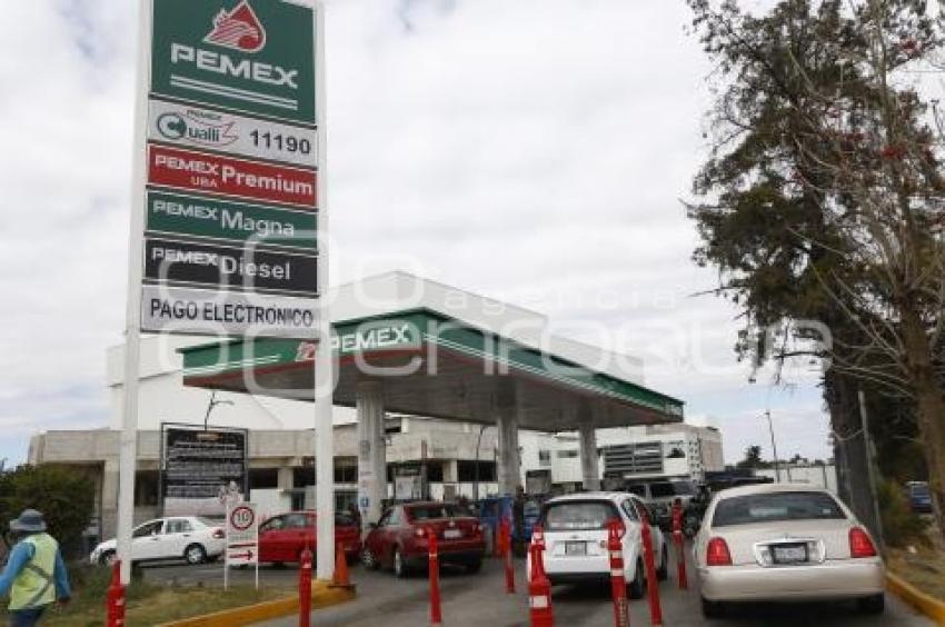 GASOLINA . REDUCCIÓN DE PRECIO