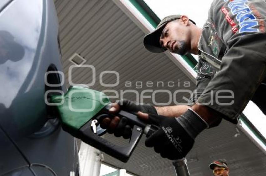 GASOLINA . REDUCCIÓN DE PRECIO