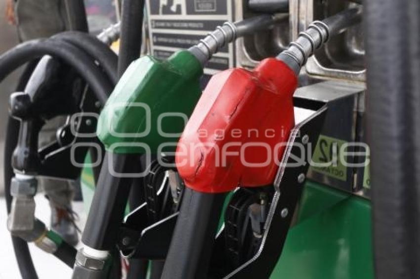 GASOLINA . REDUCCIÓN DE PRECIO