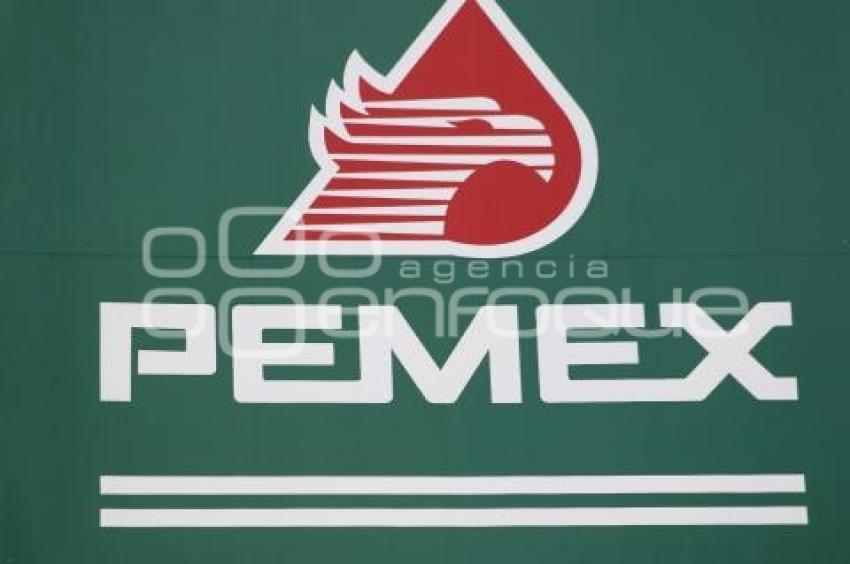 GASOLINA . REDUCCIÓN DE PRECIO