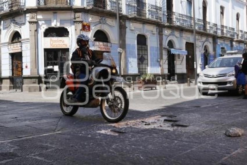 ADOQUÍN LEVANTADO