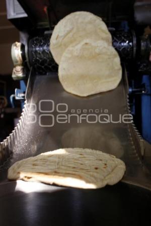 TORTILLA . ECONOMÍA