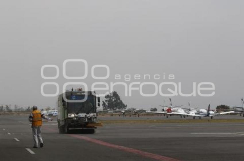 CAÍDA DE CENIZA . AEROPUERTO PUEBLA