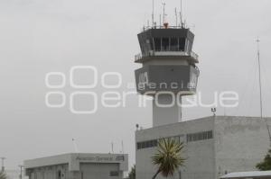 CAÍDA DE CENIZA . AEROPUERTO PUEBLA