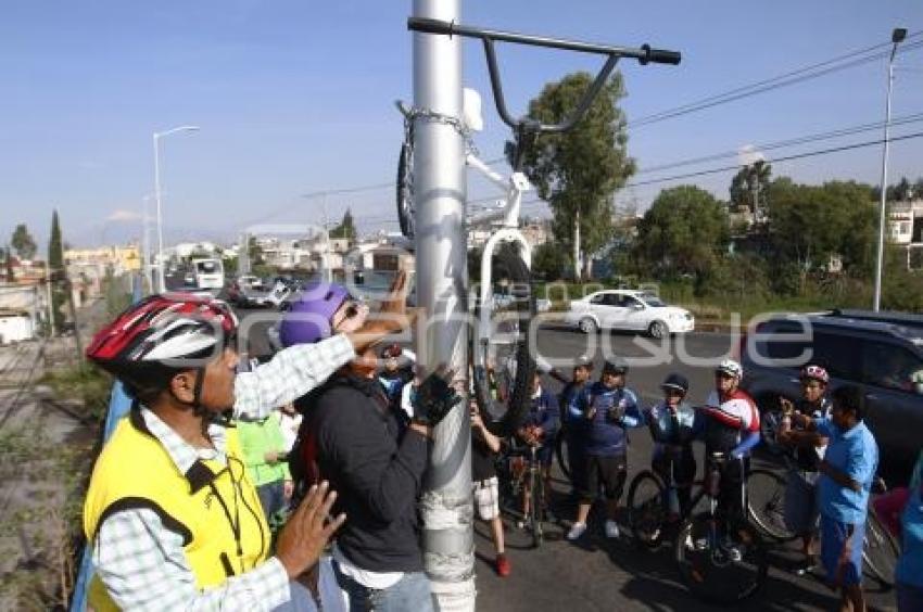 COLOCACIÓN BICICLETA BLANCA