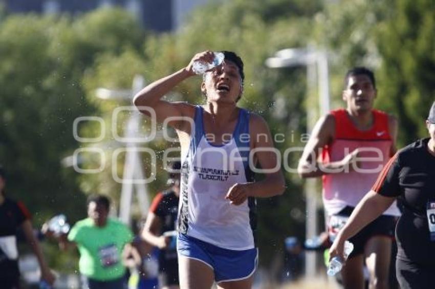 CARRERA MEDIO MARATÓN MISTER TENNIS