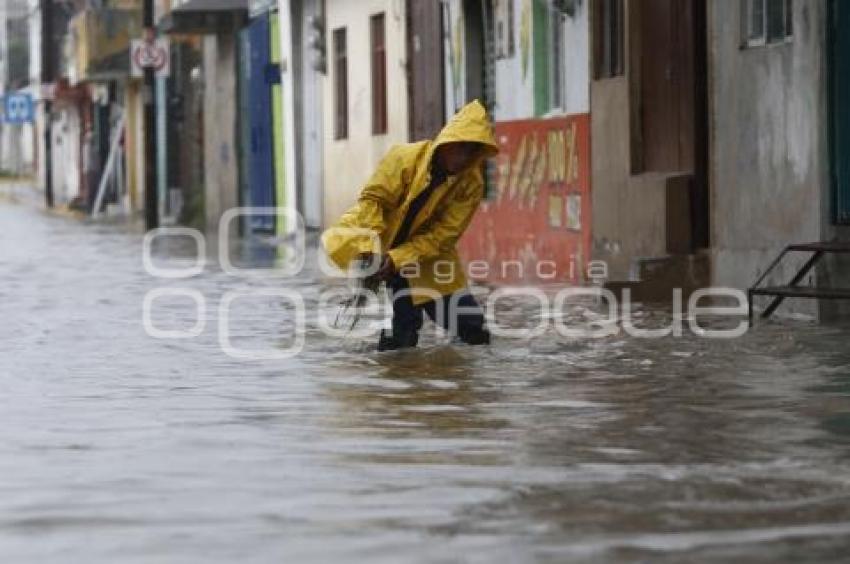 LLUVIA . INUNDACIONES