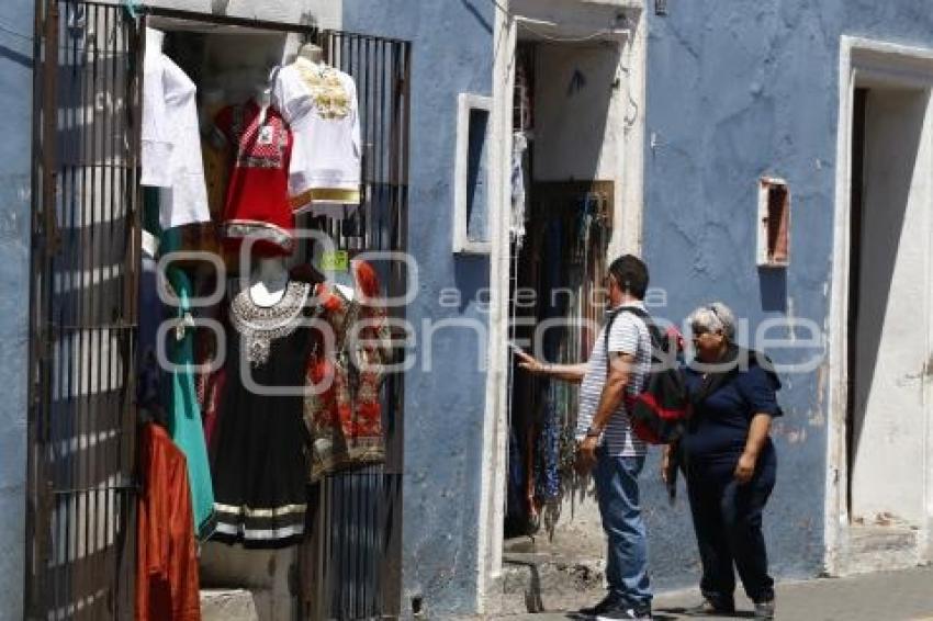 ECONOMÍA . COMERCIOS CHOLULA