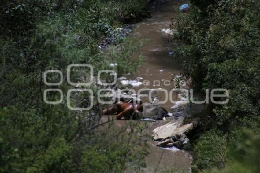 ENCUENTRAN CUERPO EN BARRANCA