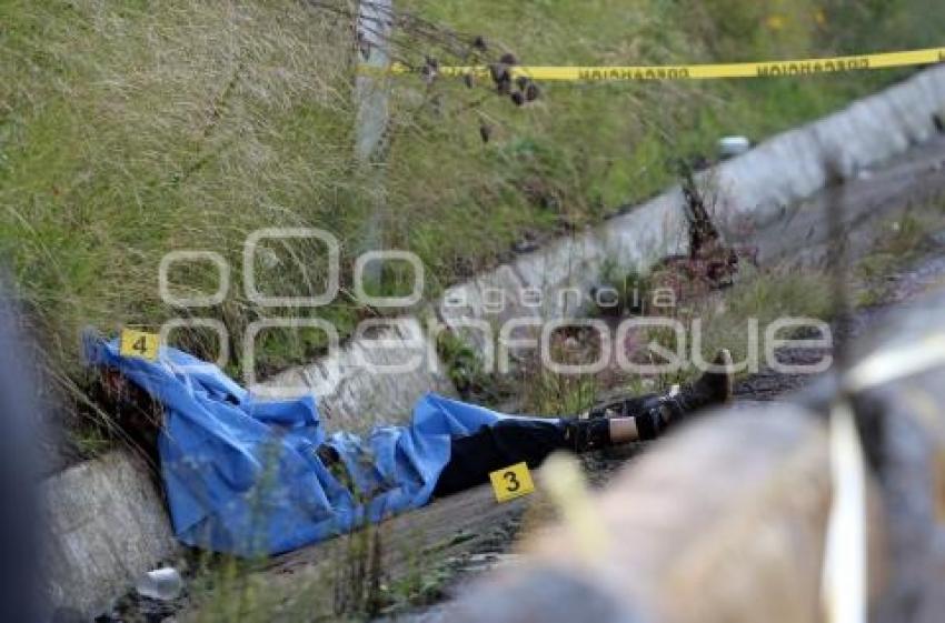 HOMICIDIO AUTOPISTA . TLAHUAPAN