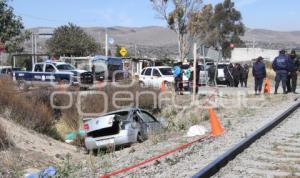 AUTO ARROLLADO POR TREN