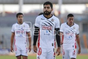 FÚTBOL . LOBOS VS CORAS