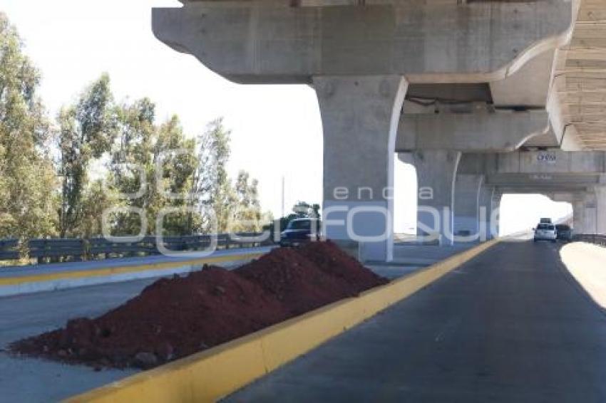 BAJO PUENTE . SEGUNDO PISO AUTOPISTA