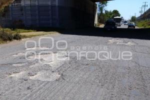 BAJO PUENTE . SEGUNDO PISO AUTOPISTA