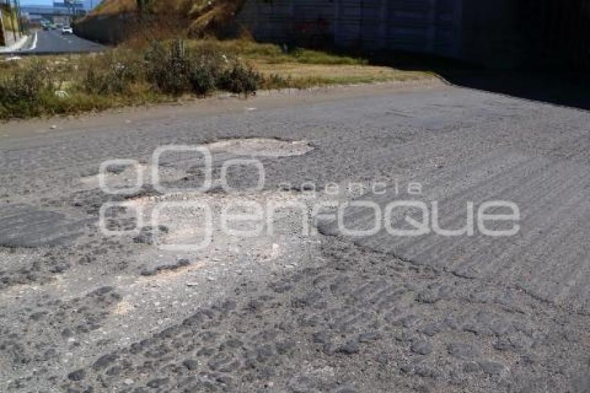 BAJO PUENTE . SEGUNDO PISO AUTOPISTA