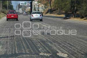 BAJO PUENTE . SEGUNDO PISO AUTOPISTA