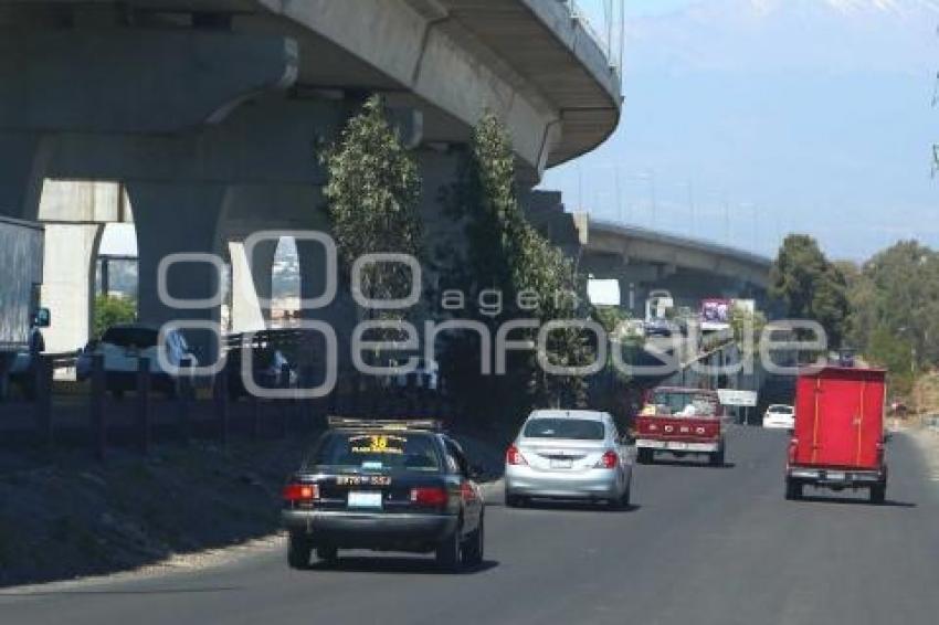 BAJO PUENTE . SEGUNDO PISO AUTOPISTA