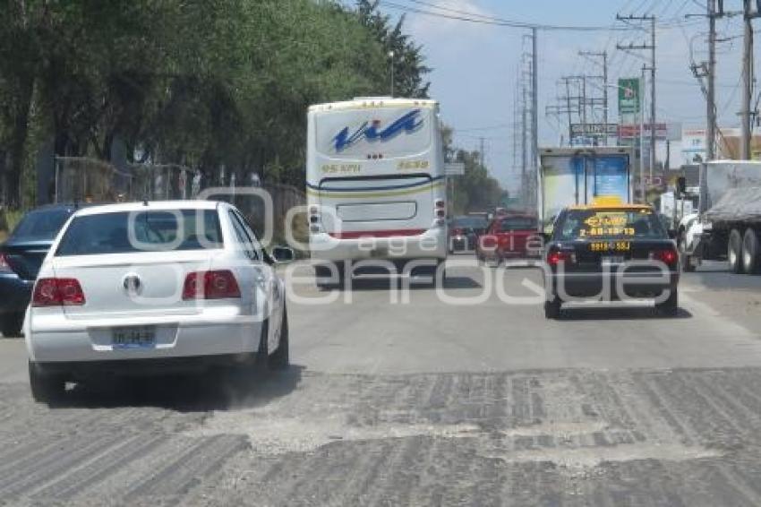 AUTOPISTA . BACHES