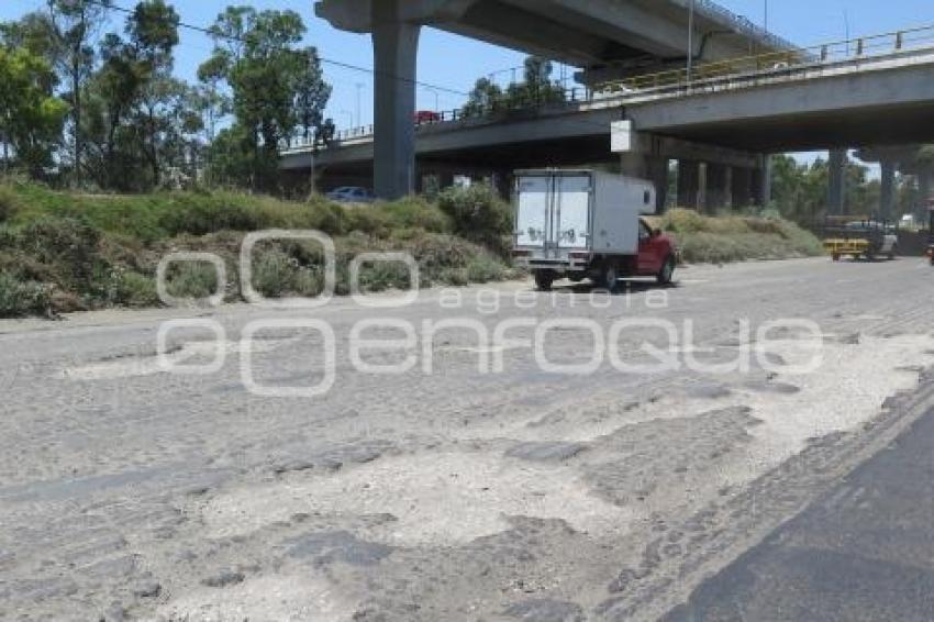 AUTOPISTA . BACHES