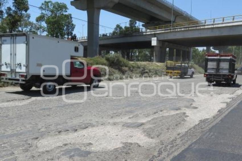 AUTOPISTA . BACHES