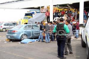 MUERTO . CENTRAL DE ABASTO