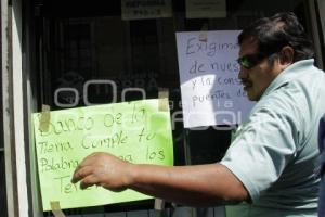 POBLADORES DE HUEJOTZINGO EXIGEN PAGO